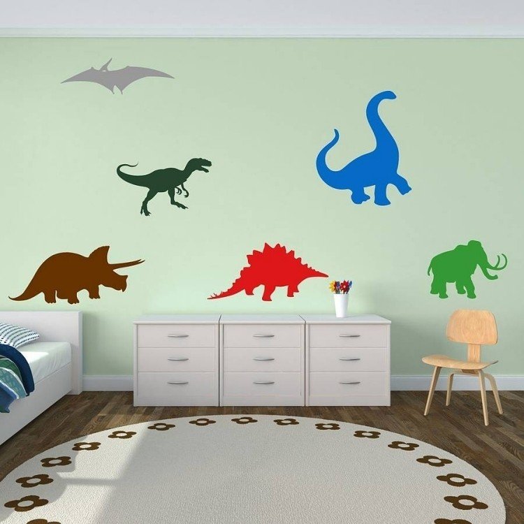 Naklejki ścienne dinozaury na miętowym zielonym tle Kolor ściany miętowy zielony -pokój dziecięcy-projekt ściany-dinozaur-komoda-dywan-okrągły