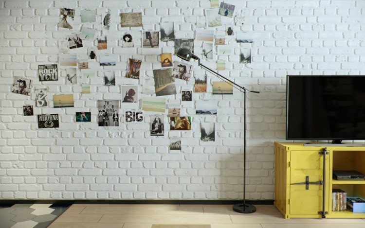 Projekt ściany ze zdjęciami design-apartament-foto-dekoracja-ściana-biała-cegła-szafka-telewizor-żółty