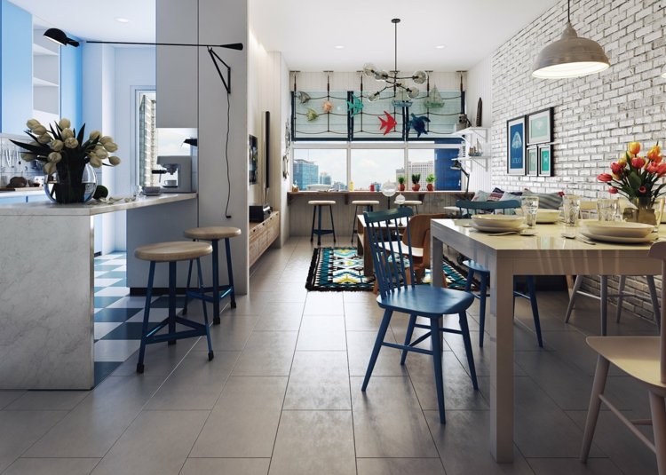 Apartament z otwartą częścią dzienną projekt mieszkania ceglana ściana jadalnia niebieskie krzesło